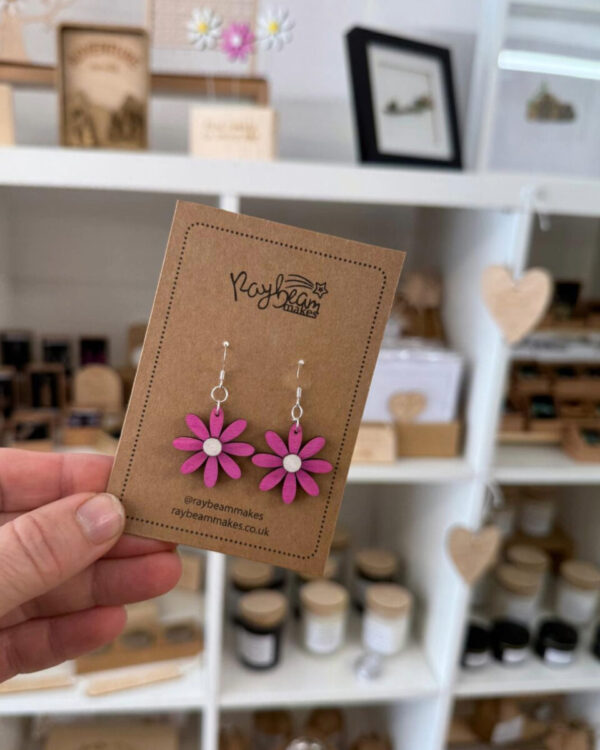 Hand-painted wooden daisy earrings with cerise pink petals and white centre