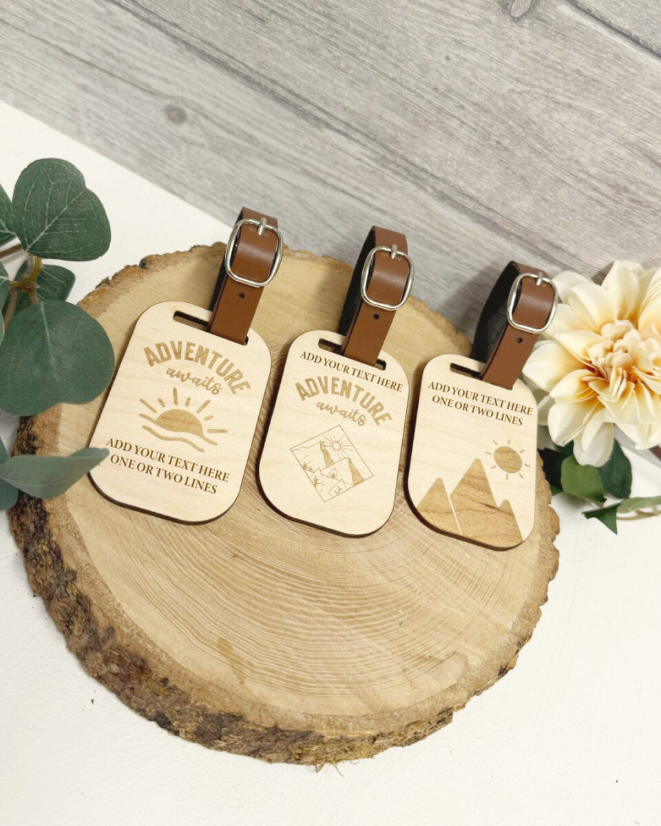 Custom wooden travel tag with Adventure awaits engraving and faux leather strap