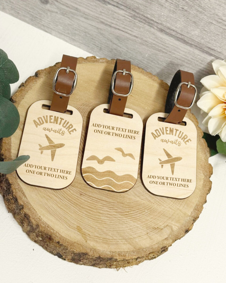 Custom wooden travel tag with Adventure awaits engraving and faux leather strap